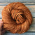 Handmade Art Yarn Butterscotch Merino, DK Weight, soft orange yarn skein, Artisan Luxury Yarn, merino wool in warm golden hue.
