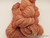 Hand-spun 2‑ply Sport/DK Merino yarn in Peach Rose Elegance — peach, rose and cream tones.