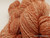 Hand-spun 2‑ply Sport/DK Merino yarn in Peach Rose Elegance — peach, rose and cream tones.