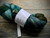 Malabrigo Nube Aguas 100% Merino Wool Roving, 4oz, blue, green, and white colors, spinning and felting fiber skein with label.
