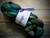 Malabrigo Nube Aguas 100% Merino Wool Roving, green, blue, and teal colored fiber, 4oz, for spinning and felting.