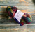 Malabrigo Merino Wool Roving in multicolored shades - pink, green, and blue - 4oz offering for spinning and felting, product by Malabrigo fiber craft.