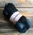 Malabrigo Nube Deep Ocean wool roving, 4oz, for spinning & felting, in a dark blue and black color blend.