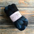 Malabrigo Nube Deep Ocean wool roving, 4oz, spinning & felting fiber in a dark blue and black ombre color, labeled NUBE.