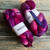 Malabrigo Nube Wool Roving, Baya Electrica, 4oz, hand-dyed Merino fiber, vibrant pink, purple, and magenta hues, combed top for spinning and felting.