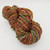 Bulky Handspun Merino Wool Yarn, A Walk Home Artisan 2-Ply, multicolored yarn with shades of red, green, yellow, and orange hues.
