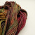 Malabrigo Rios Arco Iris yarn skein showing rainbow multi-colors