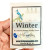 Winter Stitch Markers set of 8, snag-free enamel knitting notions, in a decorative package with blue and green winter design elements.