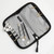 Lantern Moon Knit Aid Case with tools and accessories, gray interior, black trim, featuring knitting needles and notions in organized pockets.