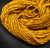 Happiness golden ochre bulky handspun merino wool yarn showing thick, 2-ply yarn.