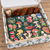 Woodland Gift box packed with a felted ornament, a 1000-piece mushroom puzzle, and a skein of glitter yarn.
