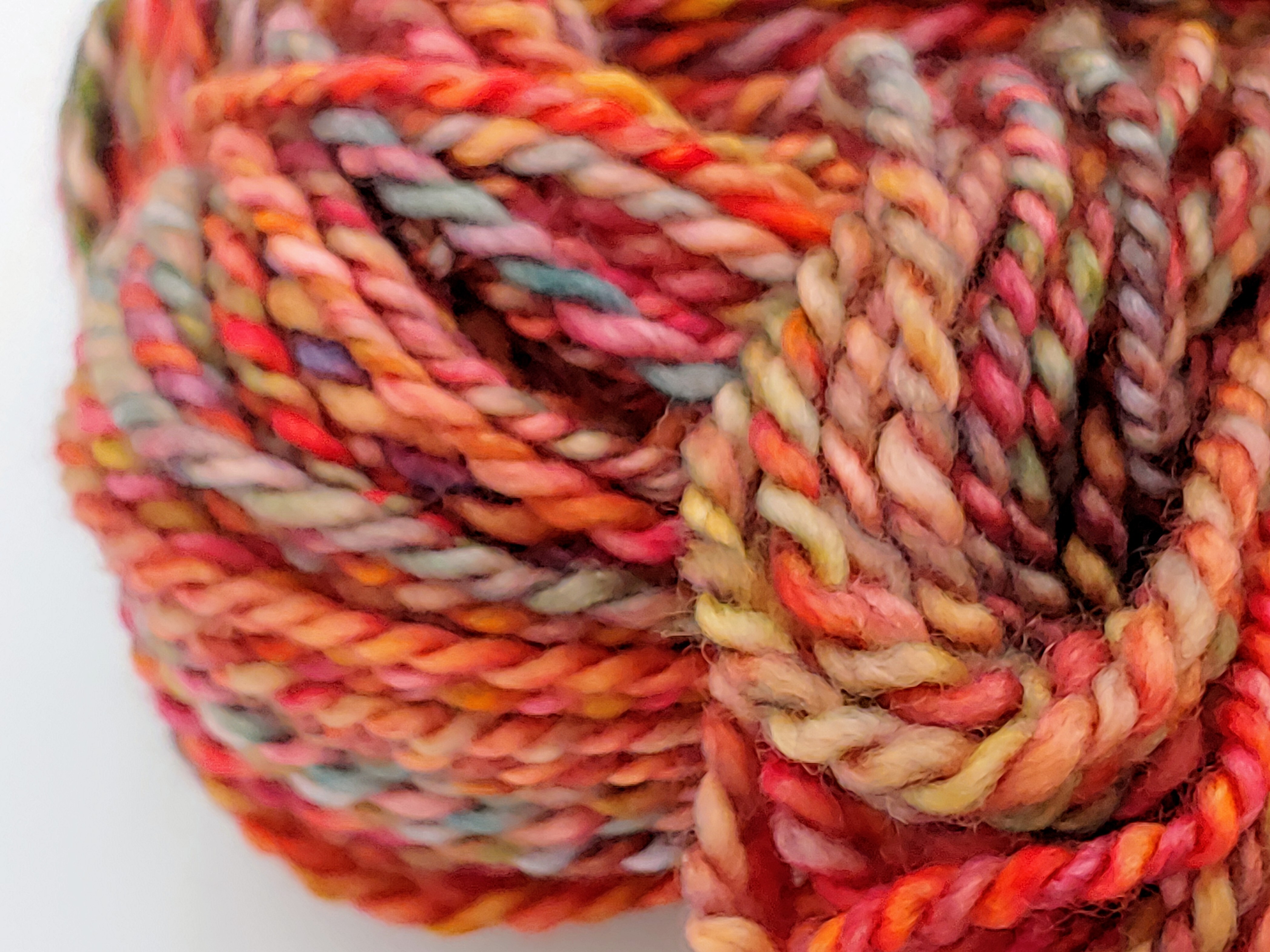 Orange Fiesta a handmade artisan merino wool yarn from Forever Winding Wool