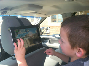 Table headrest mount with Kid in Car Seat