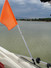 Skier Down Flag Mounted to Boat Window
