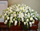 This traditional style of all white and ivory flowers is a timeless design. It consists of casablanca lilies, snap dragons, roses, stock, carnations and alstromeria lilies. 