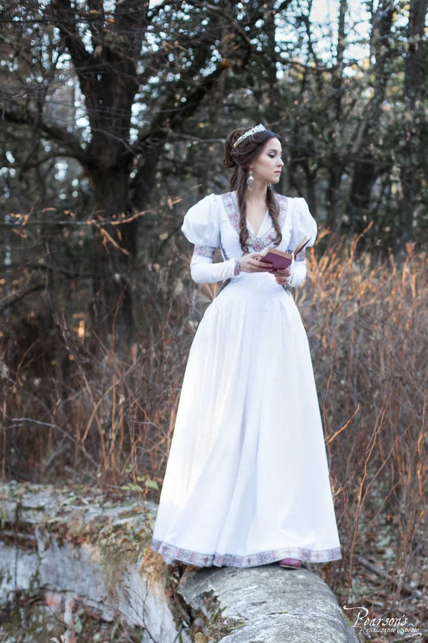 the princess dress Princess in Exile dress. Available in: white cotton, black cotton, dark  blue cotton, blue cotton, green cotton, burgundy cotton, red cotton, purple  cotton, blue rowena trim, red rowena trim, princess in exile