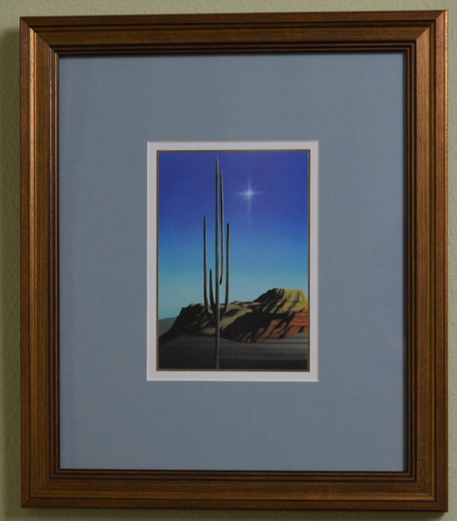 Masterpiece framing with Acid Free Blue Matting surrounded by a Copper Gold Frame.