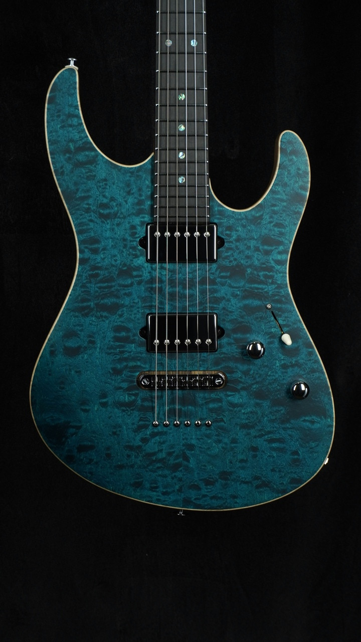 Suhr Custom Modern in Transparent Teal with Black Limba Body