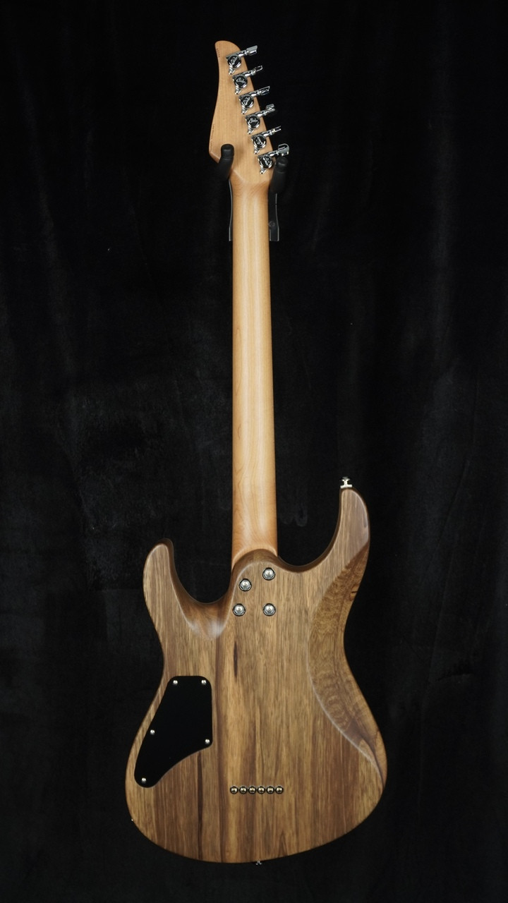 Suhr Custom Modern in Transparent Teal with Black Limba Body