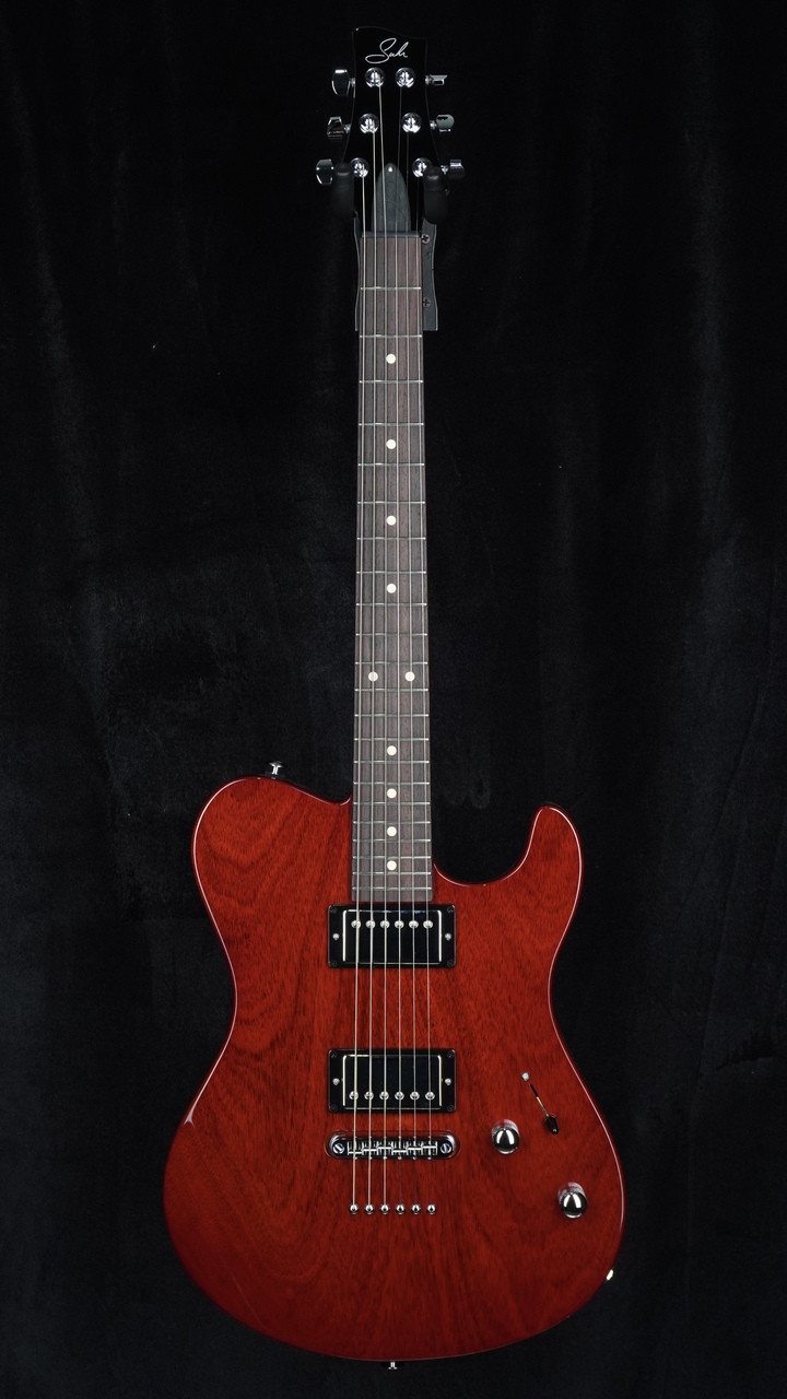 Suhr Oso Mahogany in Transparent Red with TP6 Stoptail Bridge