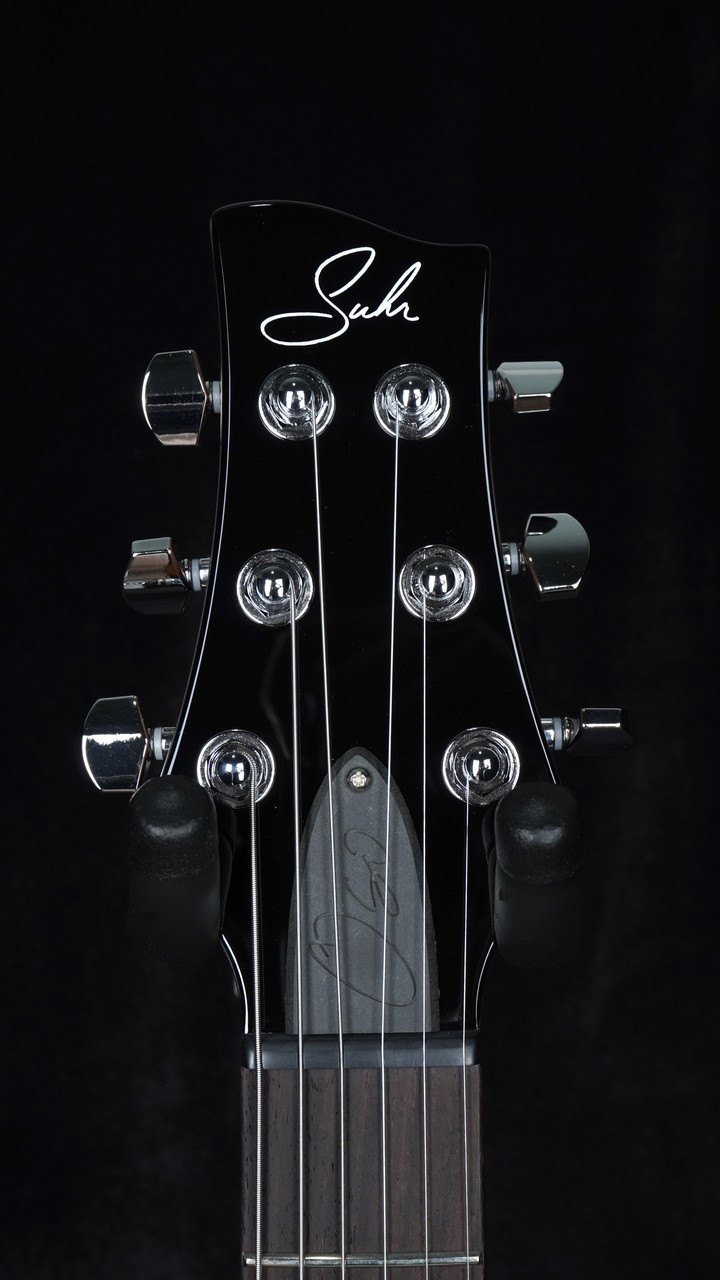 Suhr Oso Mahogany in Transparent Red with TP6 Stoptail Bridge