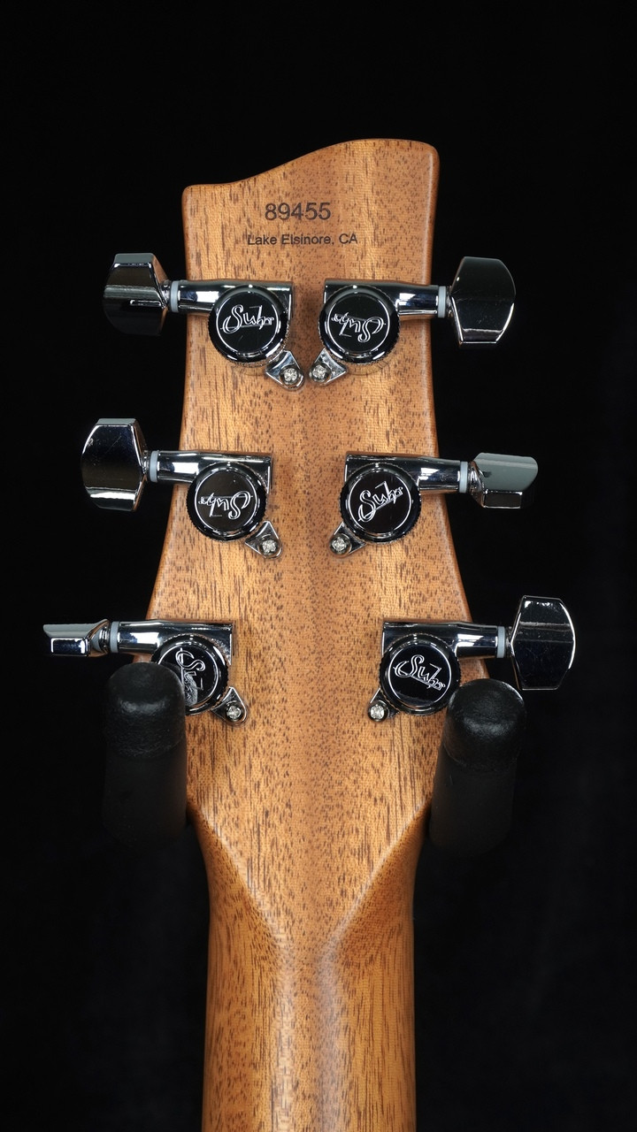 Suhr Oso Mahogany in Transparent Red with TP6 Stoptail Bridge