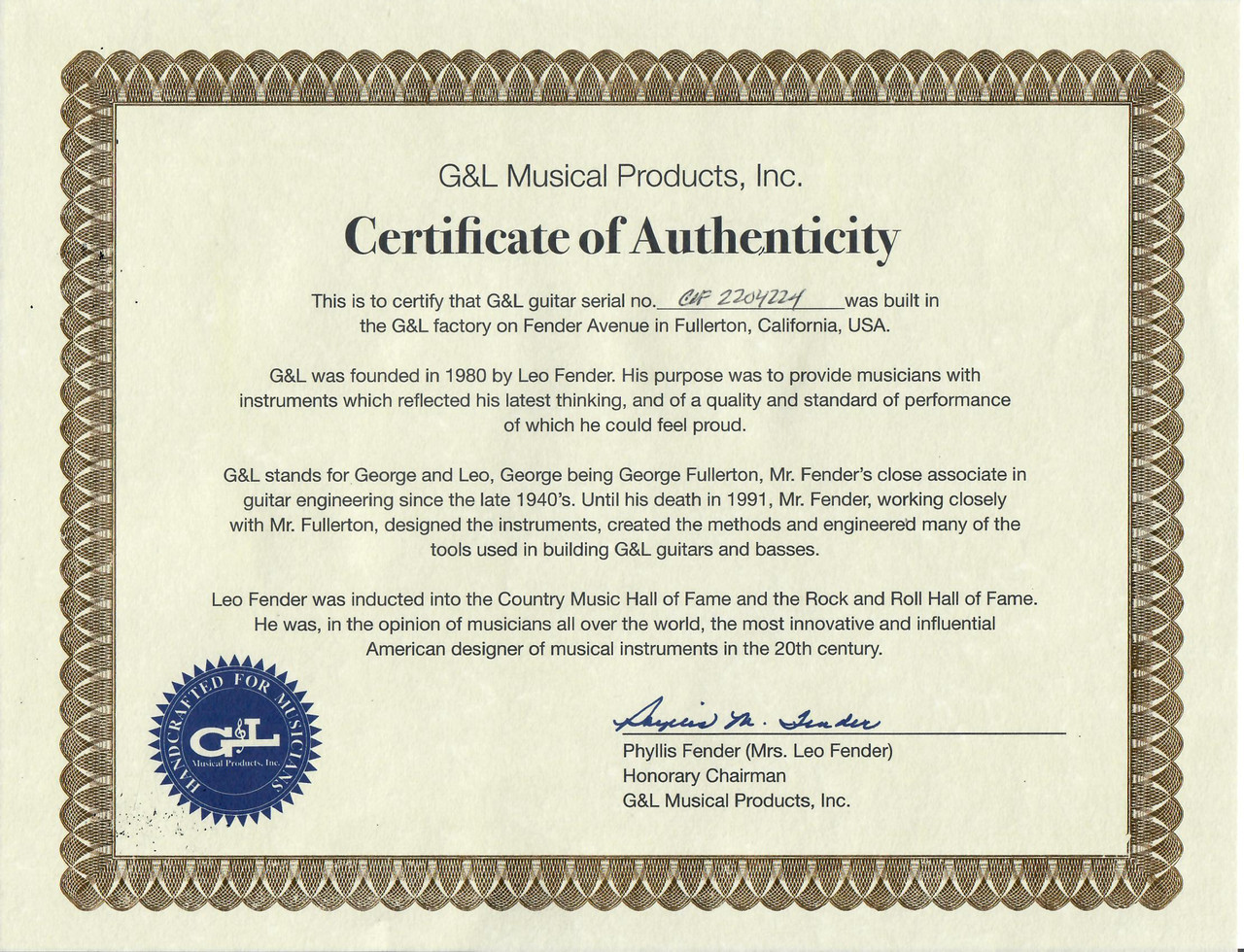 Preowned USA G&L Legacy in Sunset Coral with Maple Fretboard