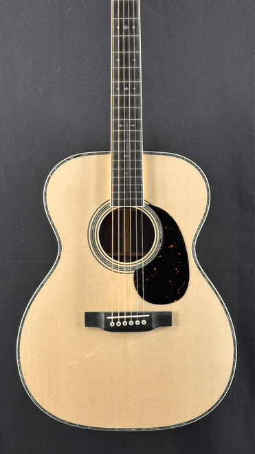 Martin Custom Shop 000 in Figured Black Walnut with Italian Alpine Spruce Top Close