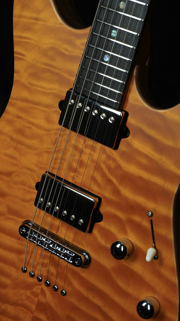 Suhr Custom Modern in Transparent Amber with Black Limba Body