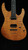 Suhr Custom Modern in Transparent Amber with Black Limba Body