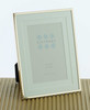 Sixtrees Park Lane Gold narrow profile 6 x 4 inch photoframe with a soft white double mount.