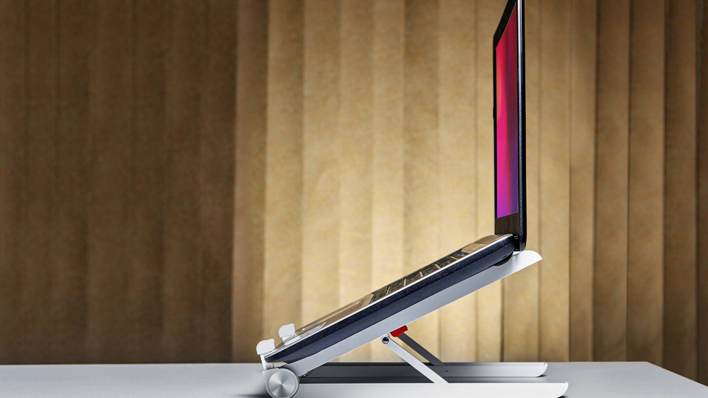 Why a Tilted Laptop Stand is the Secret to Comfort and Productivity Why a Tilted Laptop Stand is the Secret to Comfort and Productivity