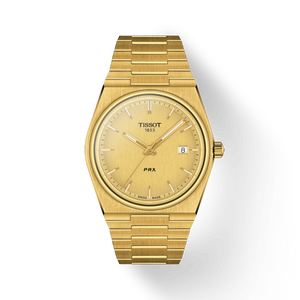 Front View: Tissot PRX 40 mm with champagne dial and full yellow-gold PVD case & bracelet.
 Front View: Tissot PRX 40 mm with champagne dial and full yellow-gold PVD case & bracelet.