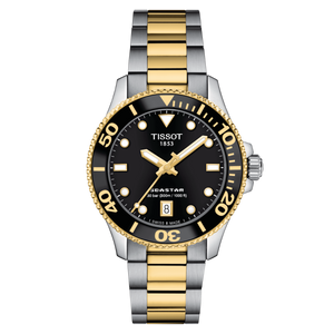Front View: Tissot Seastar 1000 36 mm with black dial and two-tone stainless-steel/yellow-gold PVD case & bracelet.
 Front View: Tissot Seastar 1000 36 mm with black dial and two-tone stainless-steel/yellow-gold PVD case & bracelet.