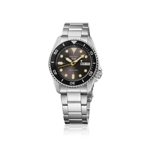 Seiko 5 Sports SKX SRPL79 38mm automatic watch with charcoal grey dial, gold accents, black unidirectional bezel, stainless steel case and stainless steel bracelet.