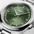 “Longines Conquest 41 mm side profile showing stainless steel case and green dial.”