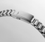 Bracelet detail with stainless steel links and double security folding clasp with micro-adjustment.
