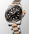 Longines HydroConquest L3.769.3.58.7 Swiss Made 42mm quartz dive watch with black sandblasted dial, black unidirectional rotating bezel, and stainless steel with red PVD-coated bracelet.