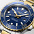 Longines HydroConquest L3.769.3.96.7 Swiss Made 42mm quartz dive watch with blue sandblasted dial, blue unidirectional rotating bezel, and stainless steel with yellow PVD-coated bracelet.