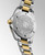 Longines HydroConquest L3.769.3.56.7 Swiss Made 42mm quartz dive watch with black sandblasted dial, black unidirectional rotating bezel, and stainless steel with yellow PVD-coated bracelet.