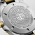 Longines HydroConquest L3.769.3.56.7 Swiss Made 42mm quartz dive watch with black sandblasted dial, black unidirectional rotating bezel, and stainless steel with yellow PVD-coated bracelet.