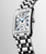 Longines DolceVita L5.512.4.70.6 Swiss Made quartz watch with silver flinqué dial, Roman numerals, blued steel hands, rectangular stainless steel case, and stainless steel bracelet.