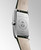 Longines DolceVita L5.512.4.08.2 Swiss Made quartz watch with an ivory gilt flinqué dial, applied Roman numerals, gilt hands, rectangular stainless steel case, and olive green alligator leather strap.