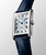 Longines DolceVita L5.255.4.70.2 Swiss Made quartz watch with a silver flinqué dial, painted Roman numerals, blued steel hands, rectangular stainless steel case, and midnight blue alligator leather strap.