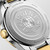 Longines Conquest L3.460.3.12.7 Swiss Made 34 mm quartz watch with a white sandblasted dial, stainless steel case with yellow gold PVD bezel, and stainless steel bracelet with yellow gold PVD centre links.