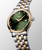 Longines Flagship Classic L4.984.3.07.7 Swiss Made 40 mm automatic watch with a sunray green diamond dial, stainless steel and red PVD case, transparent case back, and two-tone bracelet.
