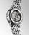 Longines Elegant Collection L4.310.0.80.6 Swiss Made 29 mm automatic watch with a white mother-of-pearl dial, diamond-set bezel, stainless steel case, transparent case back, and stainless steel bracelet.