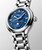 Longines PrimaLuna Moonphase L8.126.4.97.6 Swiss Made 34 mm automatic watch with a luminous blue mother-of-pearl dial, moonphase display, stainless steel case, and stainless steel bracelet.