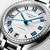 Longines PrimaLuna L8.124.0.71.6 Swiss Made 34 mm automatic watch with a sunray silver dial, diamond-set bezel, stainless steel case, transparent sapphire case back, and stainless steel bracelet.