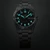 Seiko 5 Sports Field HDB006 41mm automatic watch with black dial, stainless steel case, rotating compass bezel and stainless steel bracelet.